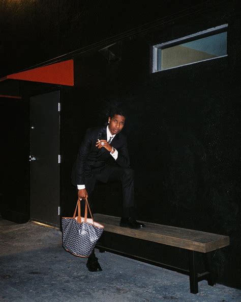 SPOTTED: ASAP Rocky Serves in Smart Suit & Goyard Bag